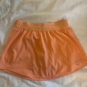Peachy orange Alo tennis skirt size M
